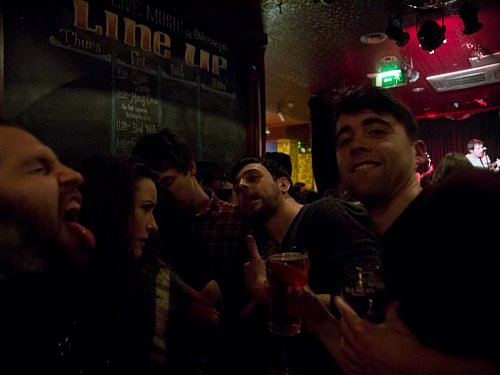 Tongues out at the couple making out